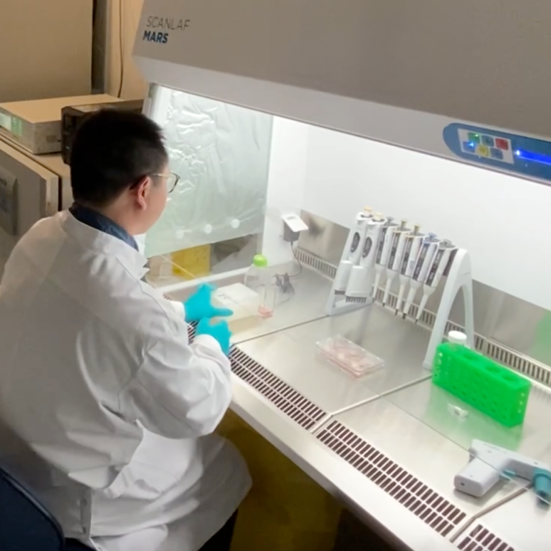 Muna scientist working in the lab